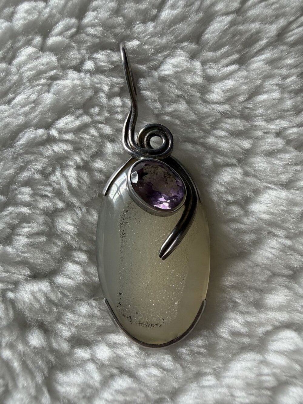 Crystal pendant with amethyst